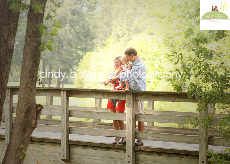 family portrait on bridge at spring creek ranch tn