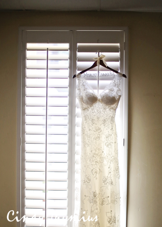 memphis wedding dress hanging up