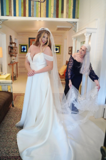 A bride trying her gown in a room